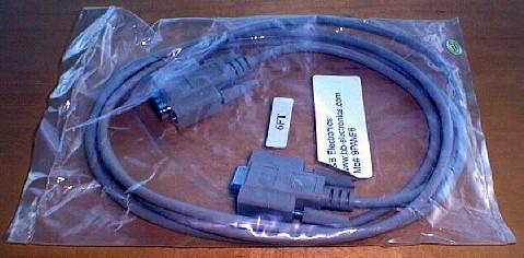 Inside the carton, you will find a blue product booklet, a serial cable, the RS extender sender and receiver, and