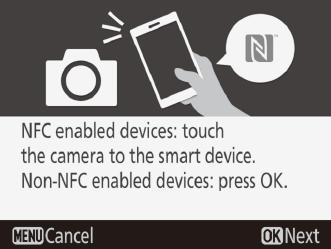 To connect using NFC, touch the NFC antenna on the smart device to the camera logo (N-Mark), then wait for the SnapBridge app to launch and proceed to Step 7.