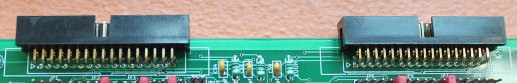 ( ) - Solder 34 pin male connectors on J1 (left side) and J2 (right