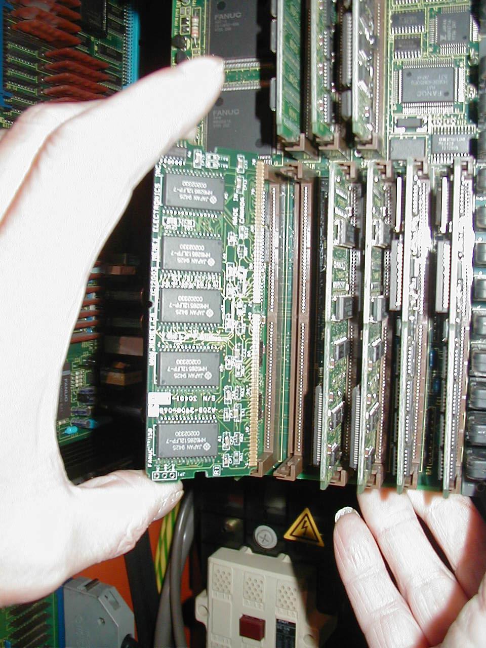 Detail showing the installation of a Memex Meg SRAM card in Slot of a MAIN-C AB-- CPU card. Note: Slot at the lower left is the SRAM slot.