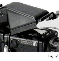 camera body, and then release the two Attaching Latches, Fig. 2. 5.