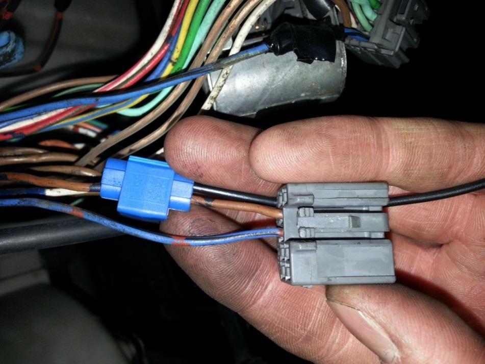 1. Plug the brown IDL2 wire from the flying lead of the stock ECU to the Sensor Ground pin (#2 on the expansion connector) like the picture above.