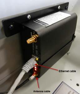 11. Plug the power cord into the cell modem module as shown in Figure 4. 12.