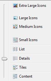 Tiles Content most efficient way to work with text files. Files and folders display as icons. Whatever information you use to sort the files displays under the file or folder name.