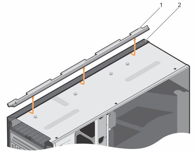 Figure 10. Installing the rack slide cover 1. rack slide cover 2. system chassis Figure 11. Removing the rack slide cover 1. rack slide cover 2. system chassis 4. Install the control panel assembly.