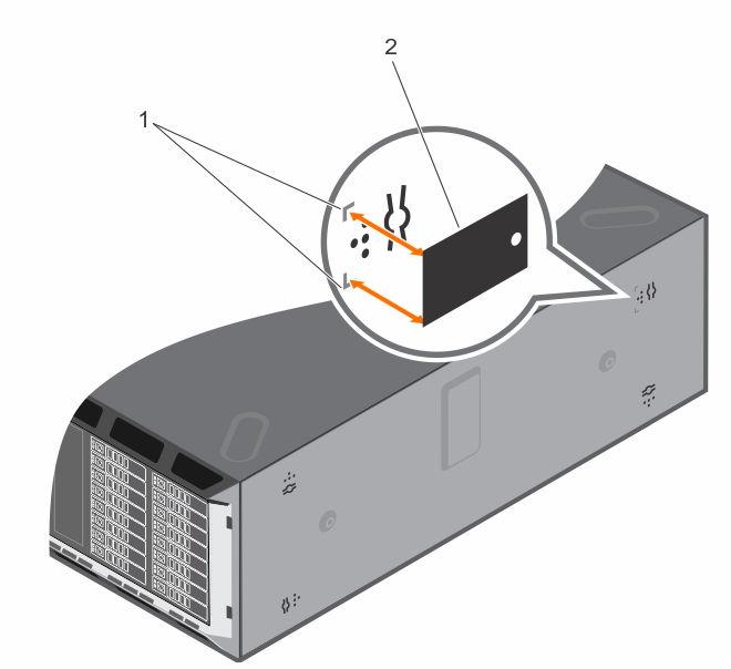 Figure 12. Attaching the mylar cover 1. marking on chassis 2. mylar cover 6. Install the system cover. 7. Install the rack ears by performing the following steps: a.