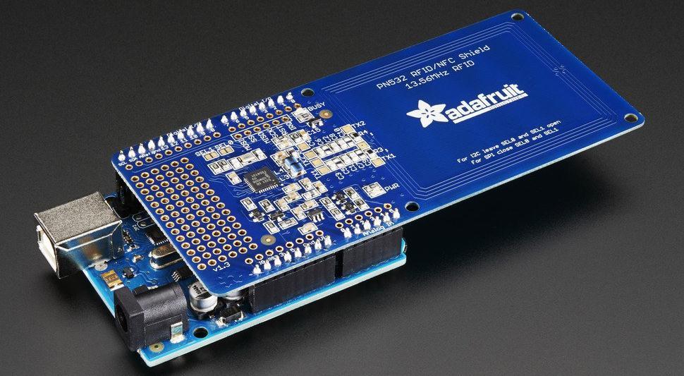 The Adafruit shield was designed by RF engineers using the best test equipment to create a layout and antenna with 10cm (4 inch) range, the maximum range possible using the 13.56MHz technology.