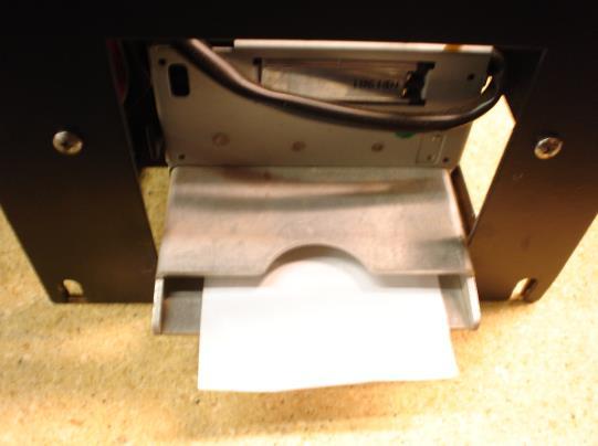 At a certain point as the paper is being fed in, the printer will detect it and automatically feed it to the printing position. When done, the setup should look like Figure P3. 1. IMPORTANT!