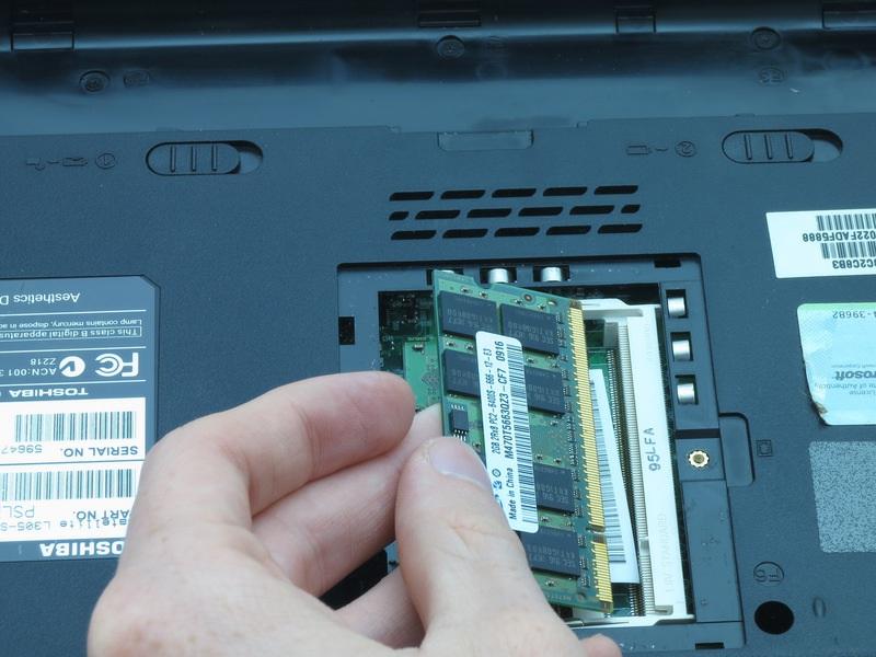 Repeat step 9 to remove the other RAM card