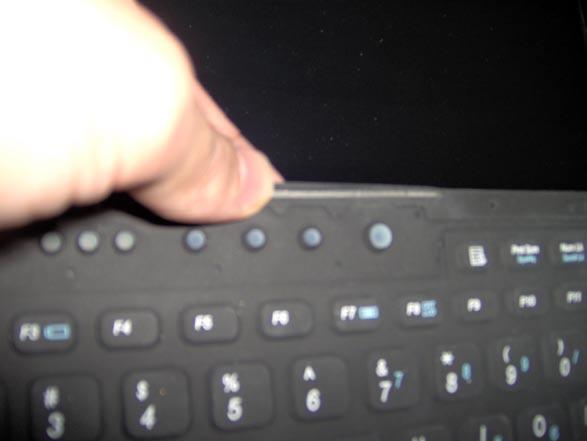7. Assemble the keyboard onto the palmrest. a.