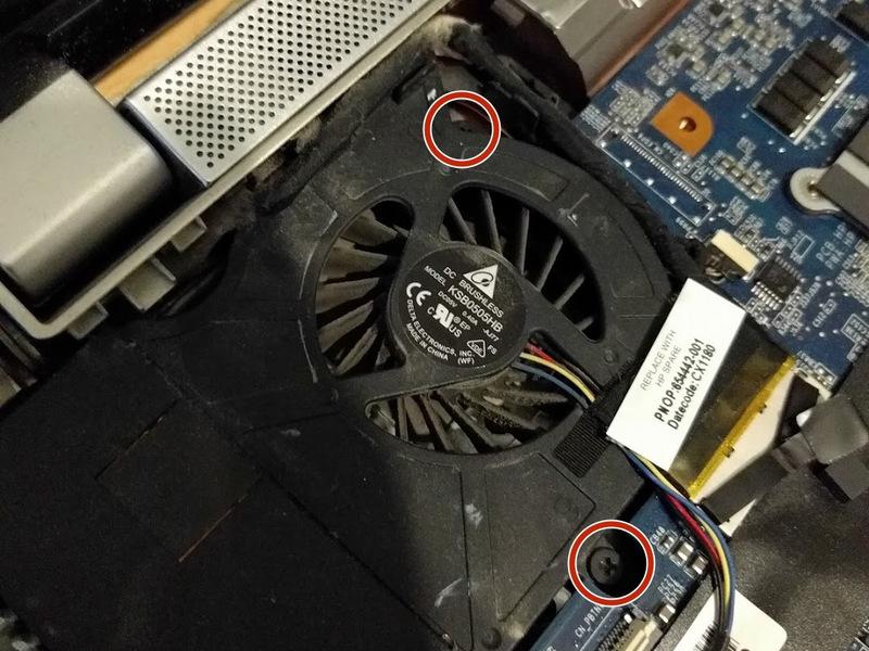 Carefully remove the motherboard and fan.