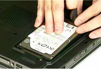 Secure 1 screw on the HDD cover 4.