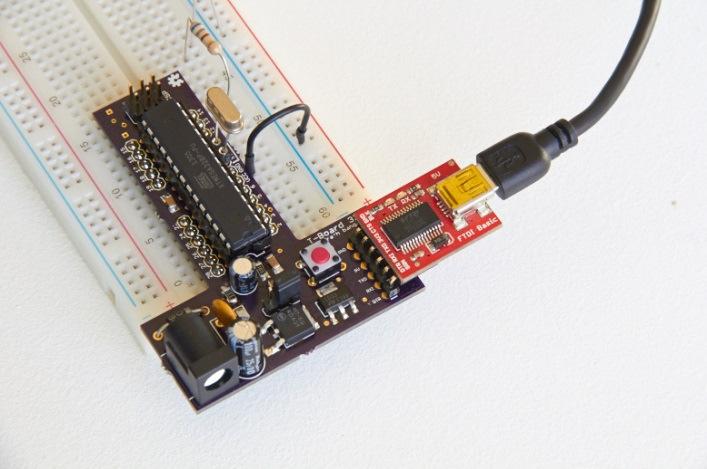 9. If you like you can now disconnect the T-Board from the ISP programmer, and connect it to a 9V battery to operate in stand-alone mode.