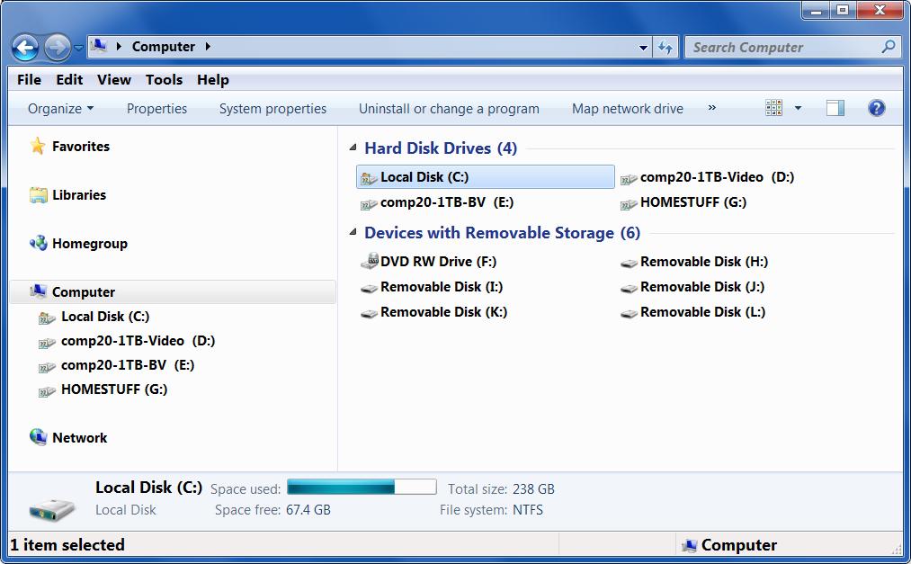 With Windows 7 Explorer open, select the expansion arrow beside Local Disk C: to expand the entry. The illustration shows the Computer, Local Disk (C:) entry has been expanded.