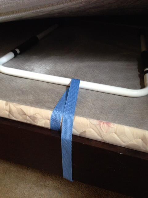 Anchoring 1. To anchor the bed assist rail to the bed frame, use the attached anchor strap as shown.