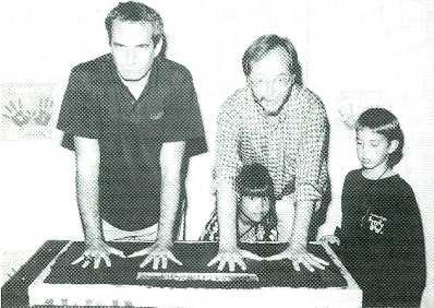 www.americanradiohistory.com Dan's Hands. Steely Dan members Donald Fagen, left, and Walter Becker imprint their hands for for the 50th induction of Hollywood's Rock Walk.