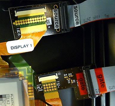 Ensure that the display connectors are fully engaged with their respective flip-lock connectors on the Eval. Kit Gate & Source connectors (red arrows).