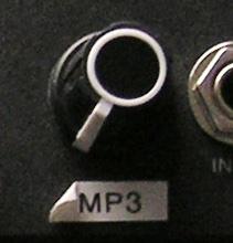 Volume is adjusted by using the MP3 knob on the SHURE mixer.