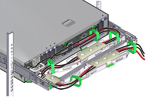 Installing a ZS5-2 Cable Management Arm through the front-most cable trough, then through the small cable trough, then through the rear-most cable trough. 17.