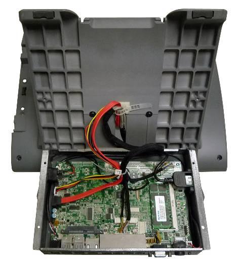 Gently flip down the system box due to various connectors connecting to the