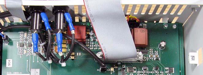 8. Remove the two screws that secure the air flow plate to the top of the Pulse Transformer board and lift the plate off