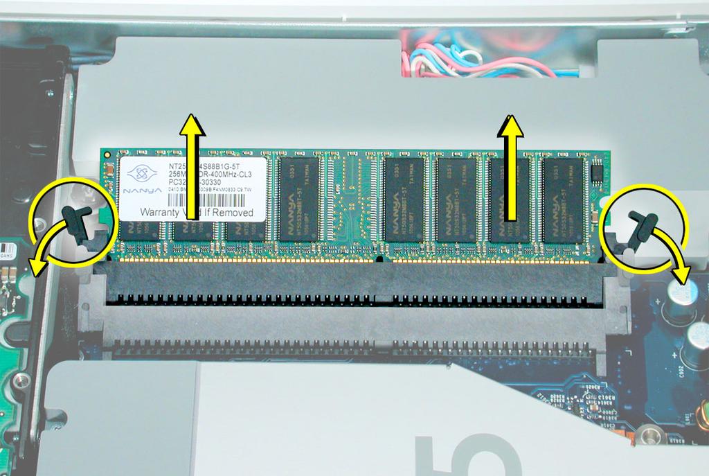 2. Locate the memory module(s) in the bottom right corner. 3. Rotate the computer counterclockwise so the memory is in the position shown below. 4.