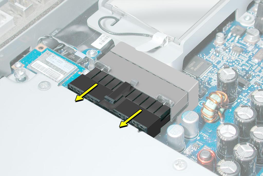 6. Pull the power supply cable out of the connector.