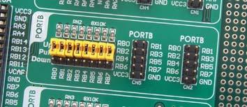 The microcontroller s RB8 pin with the relevant jumpers CN110 and RB8 push button with jumper J6 are used here for the purpose of explaining the performance of pull-up/pull-down resistors.