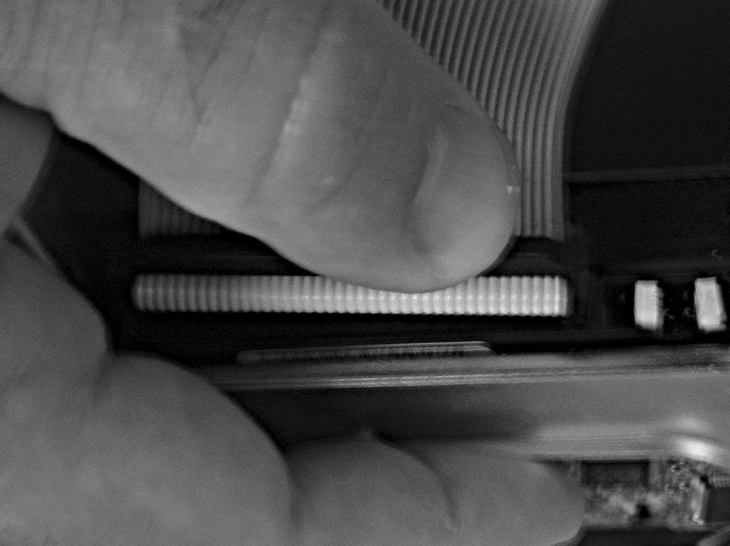 Installing an IDE Hard Drive Figure D.10 Attaching an IDE cable to your hard drive. 6 6. Now it s time to attach the ribbon cables to the hard drive(s).
