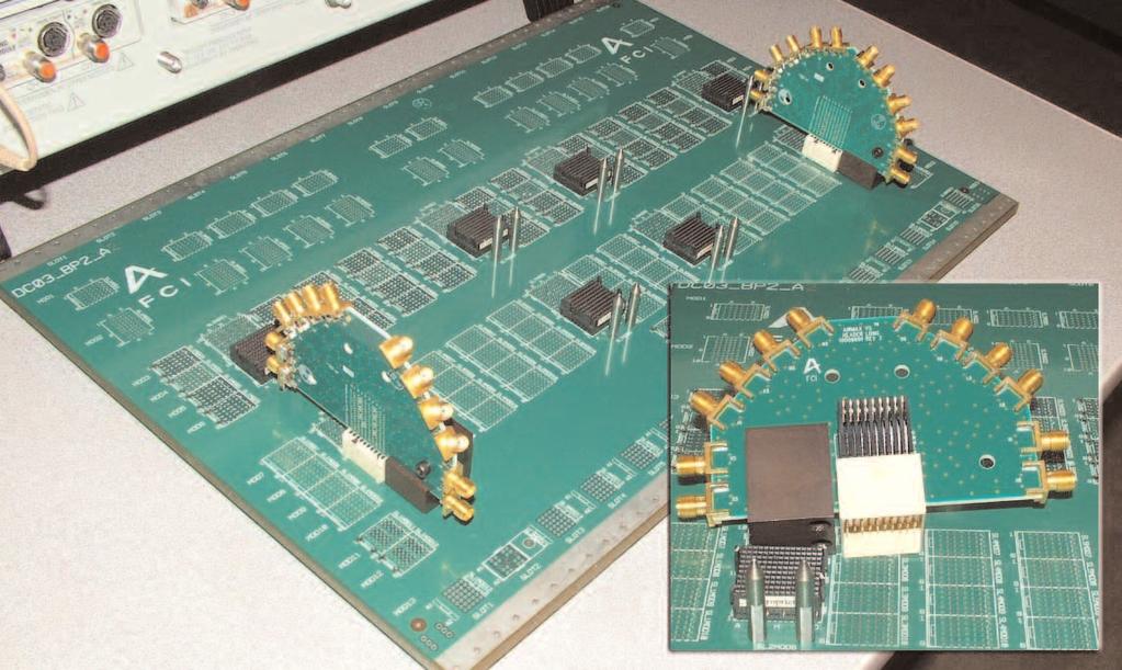 A backplane test system typically includes the test daughtercards with connectors followed by the uncoupled traces, coupled daughtercard-to-backplane connector header receptacle, coupled backplane