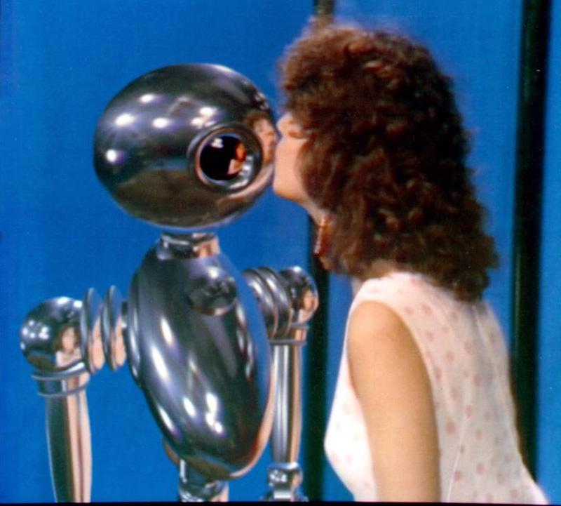 298 Environment Maps Fig. 3.3 Left: The animation Interface from 1985, shows a young woman kissing a robot.