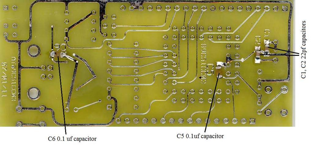 Verify that your board has all 6 capacitors in place and that C4 (the polarized capacitor) is on the board as is shown in Figure 1 (with the white stripe to the left).