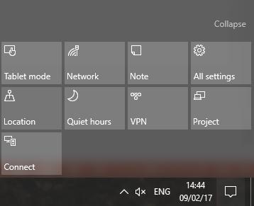 At the extreme right of the taskbar is a thin vertical bar. Clicking this will allow you to see your desktop by hiding open programs. Click it again to restore the previous view.