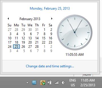 2. To adjust the computer's date and time, click the time display on the taskbar. This must be done while in the traditional desktop view if running Windows 8. 3.