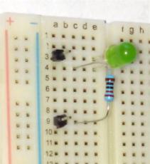 4. Connect the LED: The complete diagram Here's a picture of my breadboard: My LED's long pin is in e3 and its short pin is in e4.