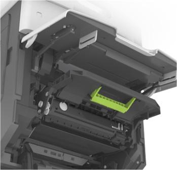 6 Pull the jammed paper gently to the right, and then remove it from the printer. 3 Place the cartridge aside.