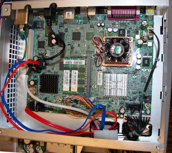(Figure 40 shows what the motherboard looks like with the rear cover of the oscilloscope removed and the cables still