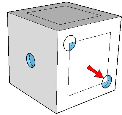 2. Then place another hole at the opposite corner