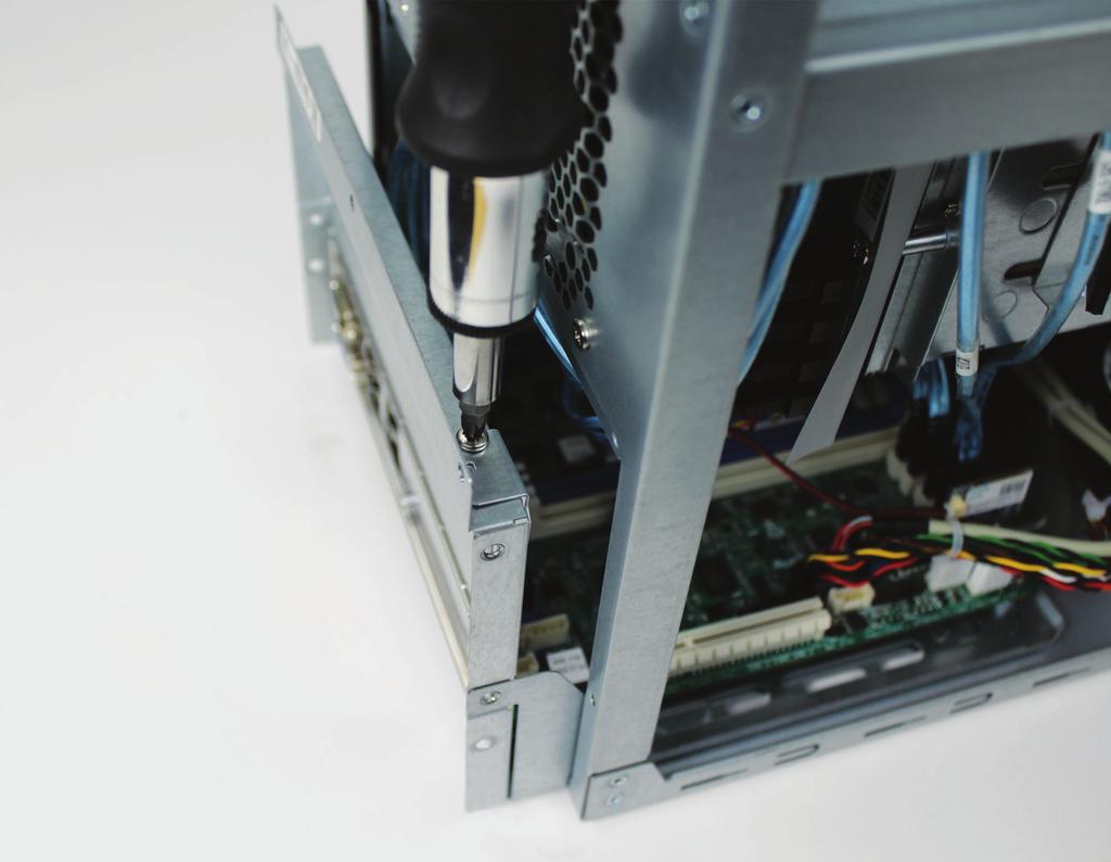 SLOT COVER REMOVAL Slide motherboard tray out an inch to