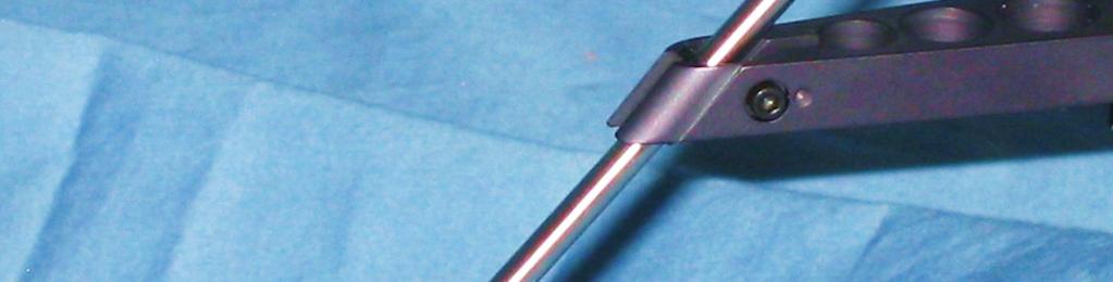 A shield wired alligator clip is provided for ground applications on all coaxial and triaxial probe holders.