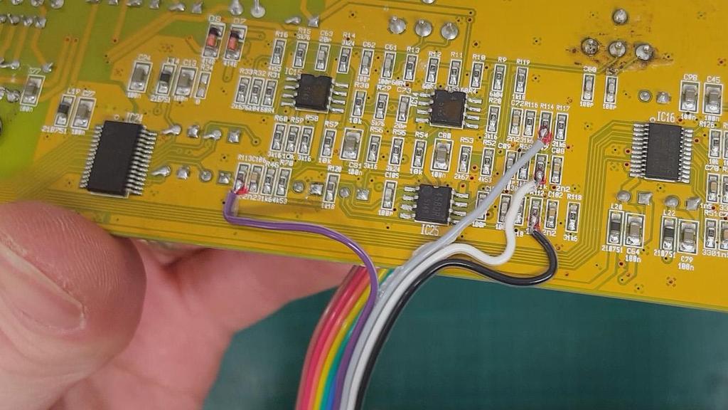 Solder the output PCB ribbon wires to the main PCB as