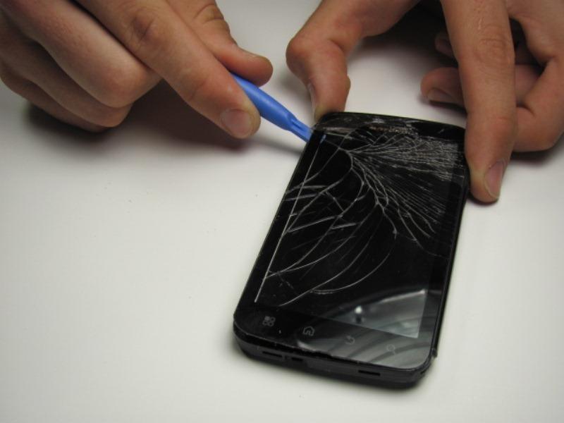 phone. As you work, the adhesive may cool and harden.