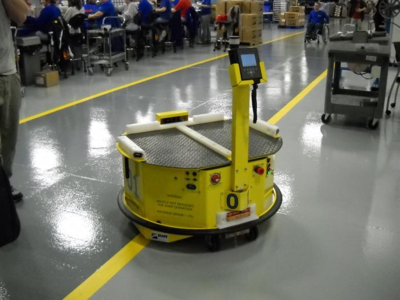 Automated Guided Vehicle (AGV) is a material handling systems that uses independently operated, self-propelled vehicles guided along defined pathways (Groover, 2008).