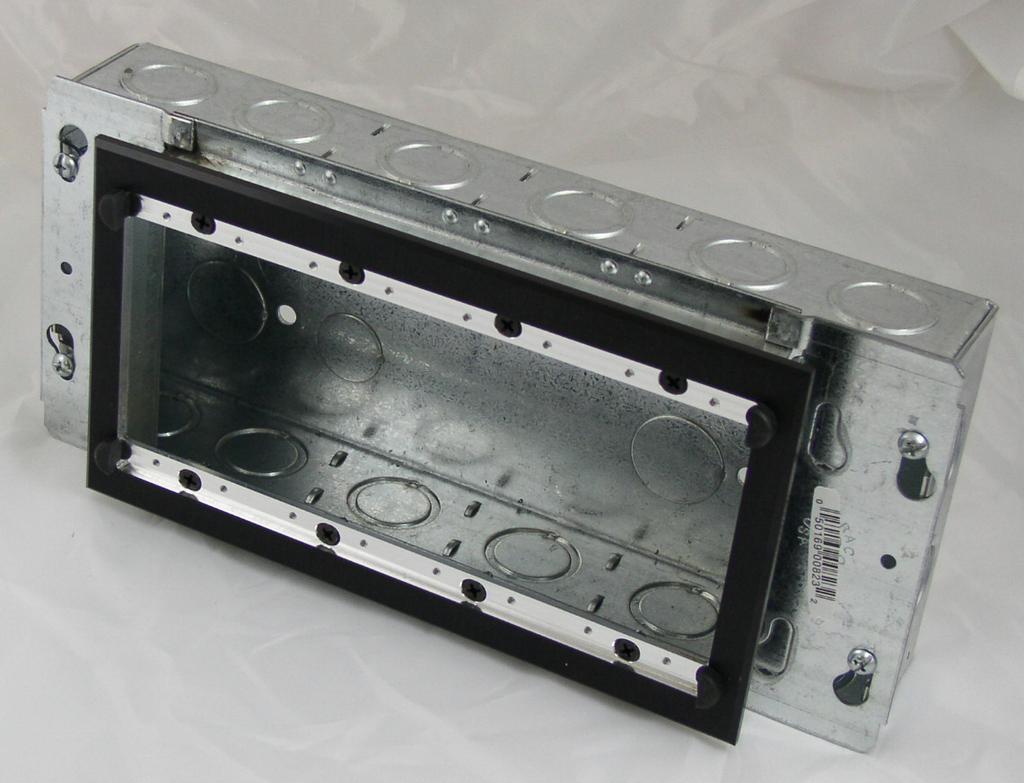 The unit is attached to the Rack Adapter using (4) 4-40 Flat head screws and square nuts inserted into a slot,