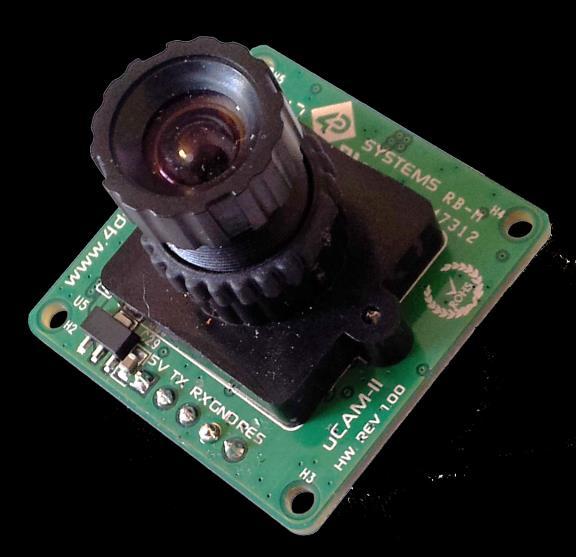 1. Description The ucam-ii (microcam-ii) is a highly integrated serial camera module which can be attached to any host system that requires a video camera or a JPEG compressed still camera for