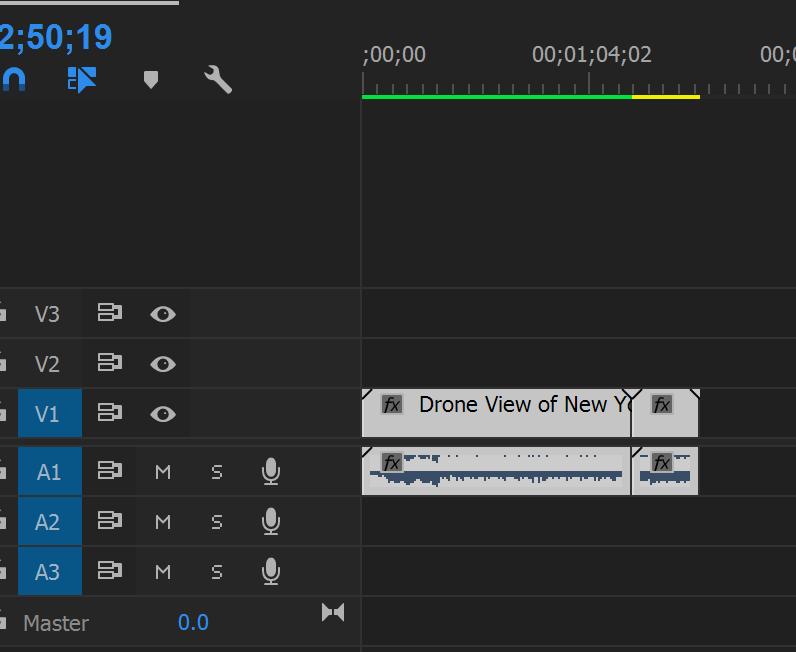 In the image above, you can see that a piece of footage has two blocks; one for the video and the other for the audio, (Which has sound waveforms in it).