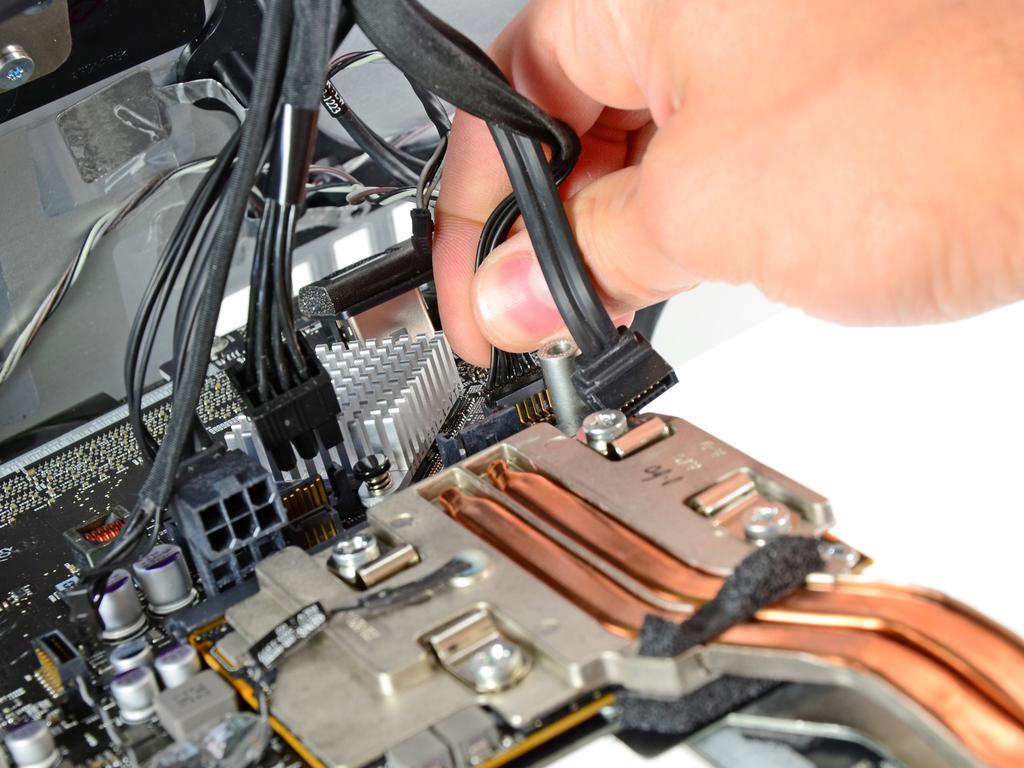 logic board, gently pull the hard drive SATA data cable straight out of its socket