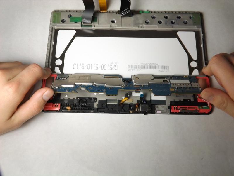Then lift up the motherboard to carefully remove it from the device.