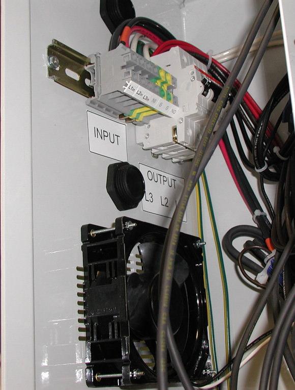 Input terminals are located on a DIN-rail inside the VRp cabinet on the left side.