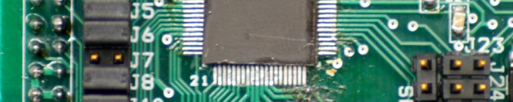 The mother board contains a USB to SPI chip, which allows us to use a computer to communicate with our chips, and is